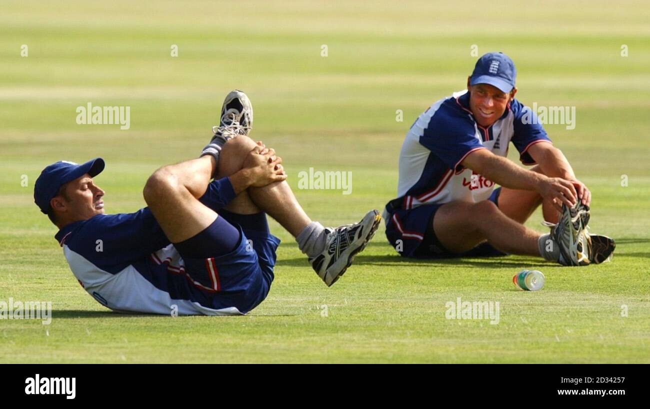 England cricket captain Nasser Hussain (left) and team-mate Nick Knight stretch during the team net session at St George's Park, Port Elizabeth.  England play their final Group A Cricket World Cup match against Australia. Stock Photo