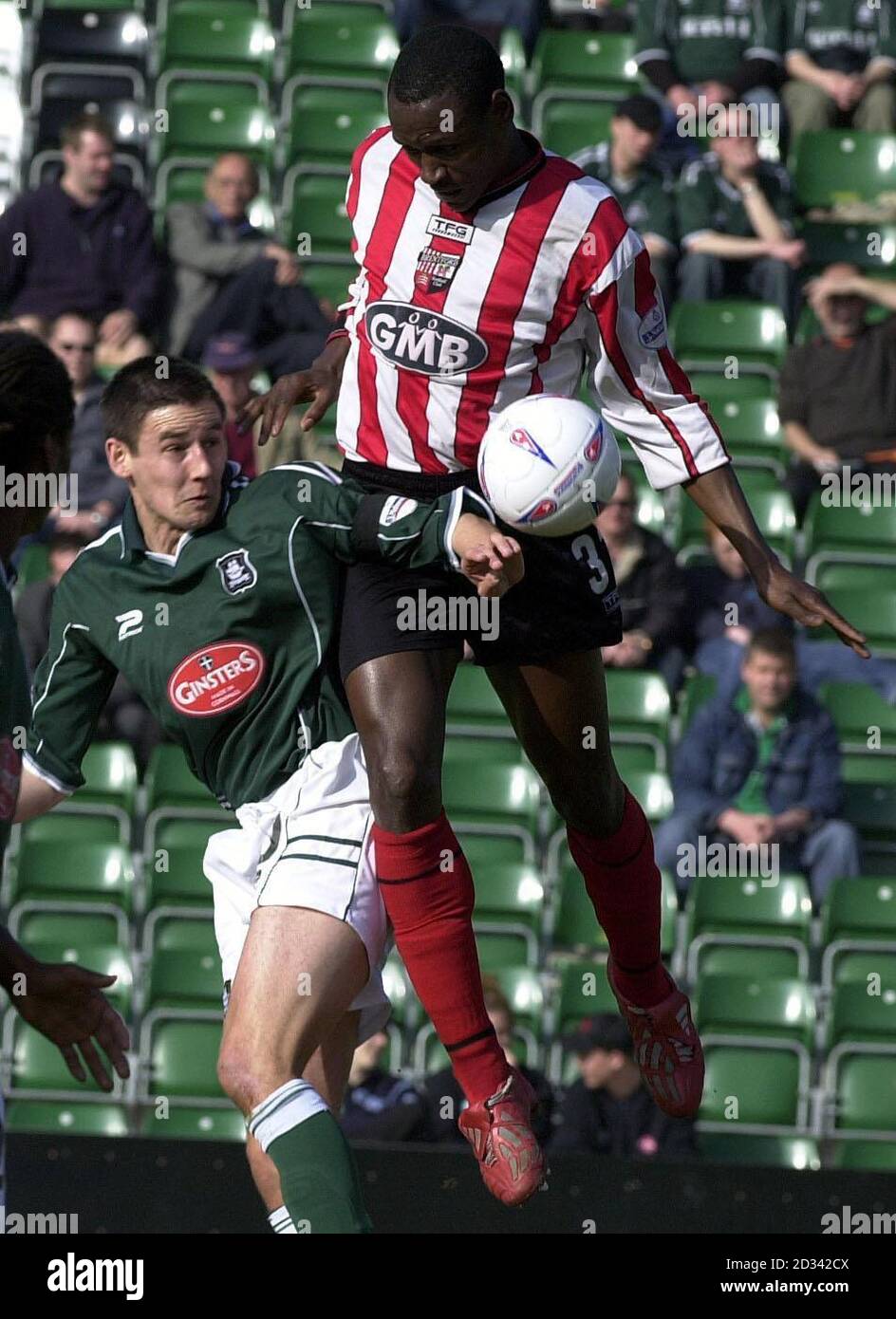 Brentford's Ibrahima Sonko (right) battle's with Plymouth's Ian Stonebridge during their Nationwide Division Three match at Plymouth's Home Park ground.  THIS PICTURE CAN ONLY BE USED WITHIN THE CONTEXT OF AN EDITORIAL FEATURE. NO UNOFFICIAL CLUB WEBSITE USE.    Stock Photo