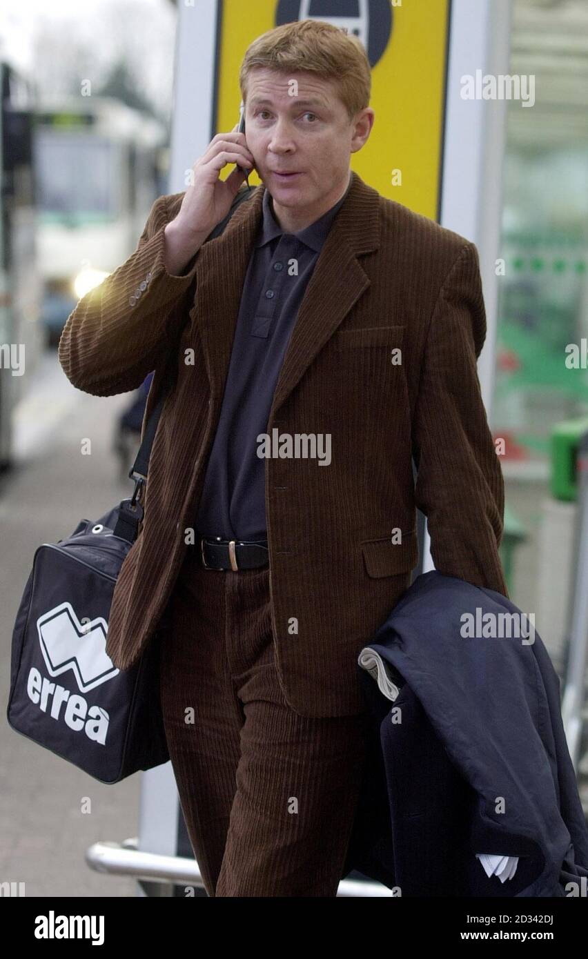 Iceland coach Atli Edvaldsson arrives with his team at Glasgow Airport, Glasgow, for their 2004 Euro Qualifier against Scotland this weekend. Stock Photo