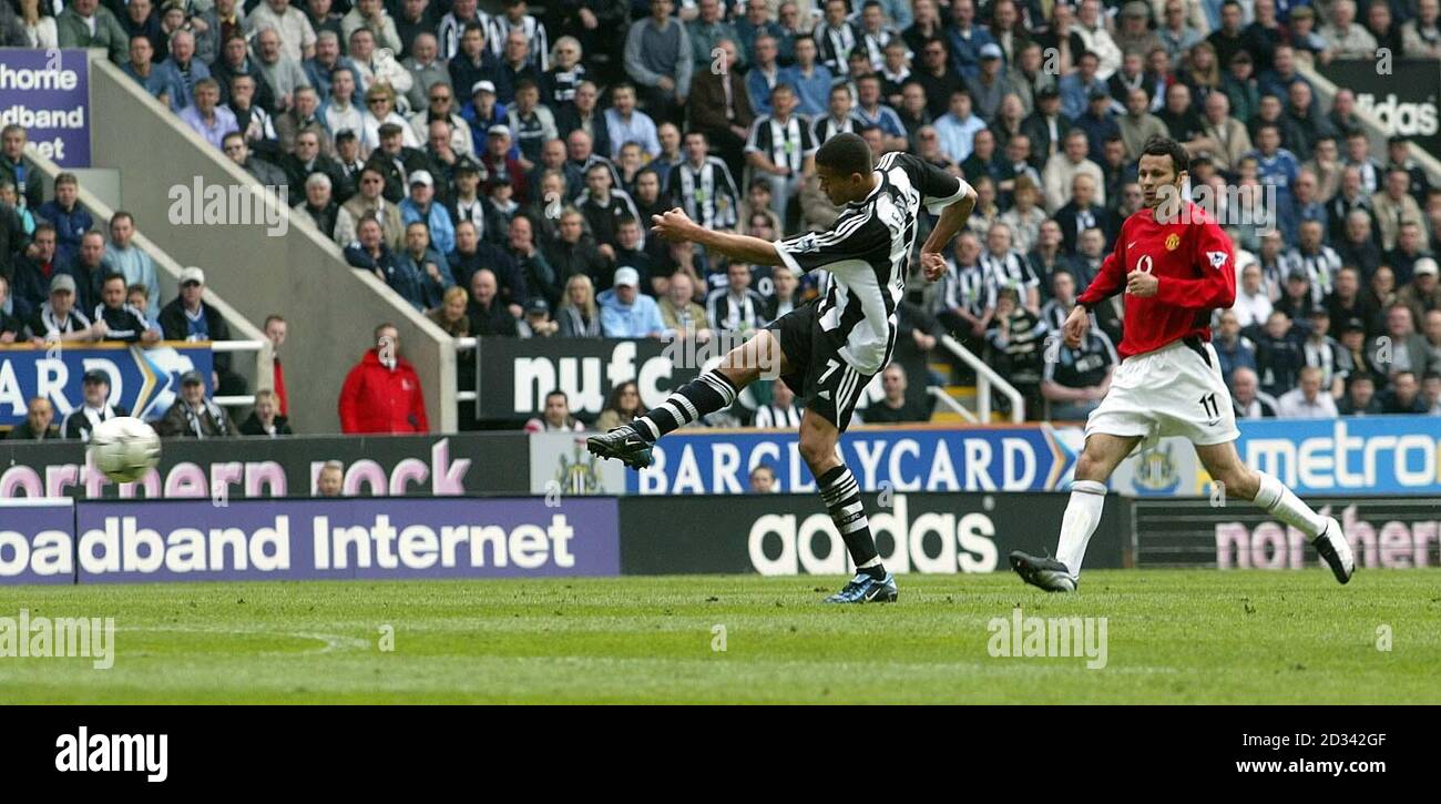 Newcastle United's Jermaine Jenas (L) scores a long range shot against Manchester United during their FA Barclaycard Premiership match at Newcastle's St James' Park. THIS PICTURE CAN ONLY BE USED WITHIN THE CONTEXT OF AN EDITORIAL FEATURE. NO WEBSITE/INTERNET USE UNLESS SITE IS REGISTERED WITH FOOTBALL ASSOCIATION PREMIER LEAGUE. Stock Photo