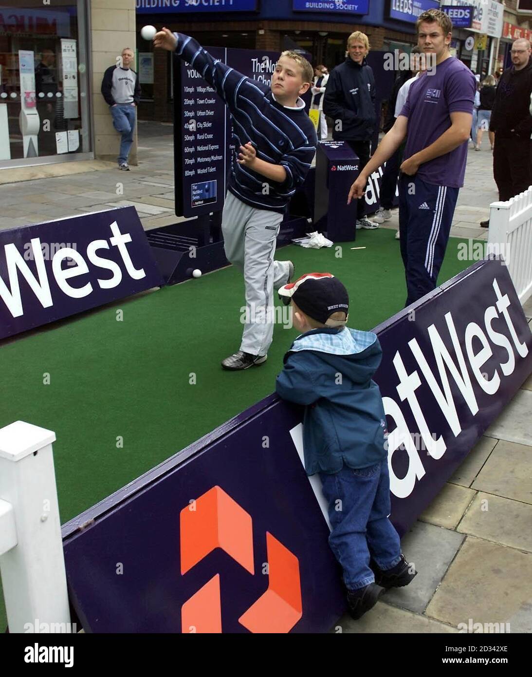 Oliver Blevins-Clarke watches as 12-year-old Ross Parker, from Wallsend, Newcastle, take part in the NatWest Speed Challenge during the NatWest Interactive Roadshow in Newcastle.   *  Two-year-old Oliver, from  Jarrow, was there to see youngsters take part in the NatWest Speed Challenge in the city's Haymarket. Stock Photo