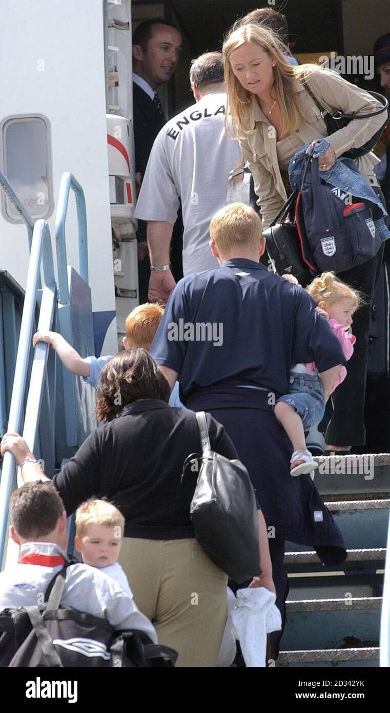 Members Of The England Football Team And Their Families Board Their Aircraft At Luton Airport For La Manga In Spain Where The England Team Have Set Up Their Training Camp For Their