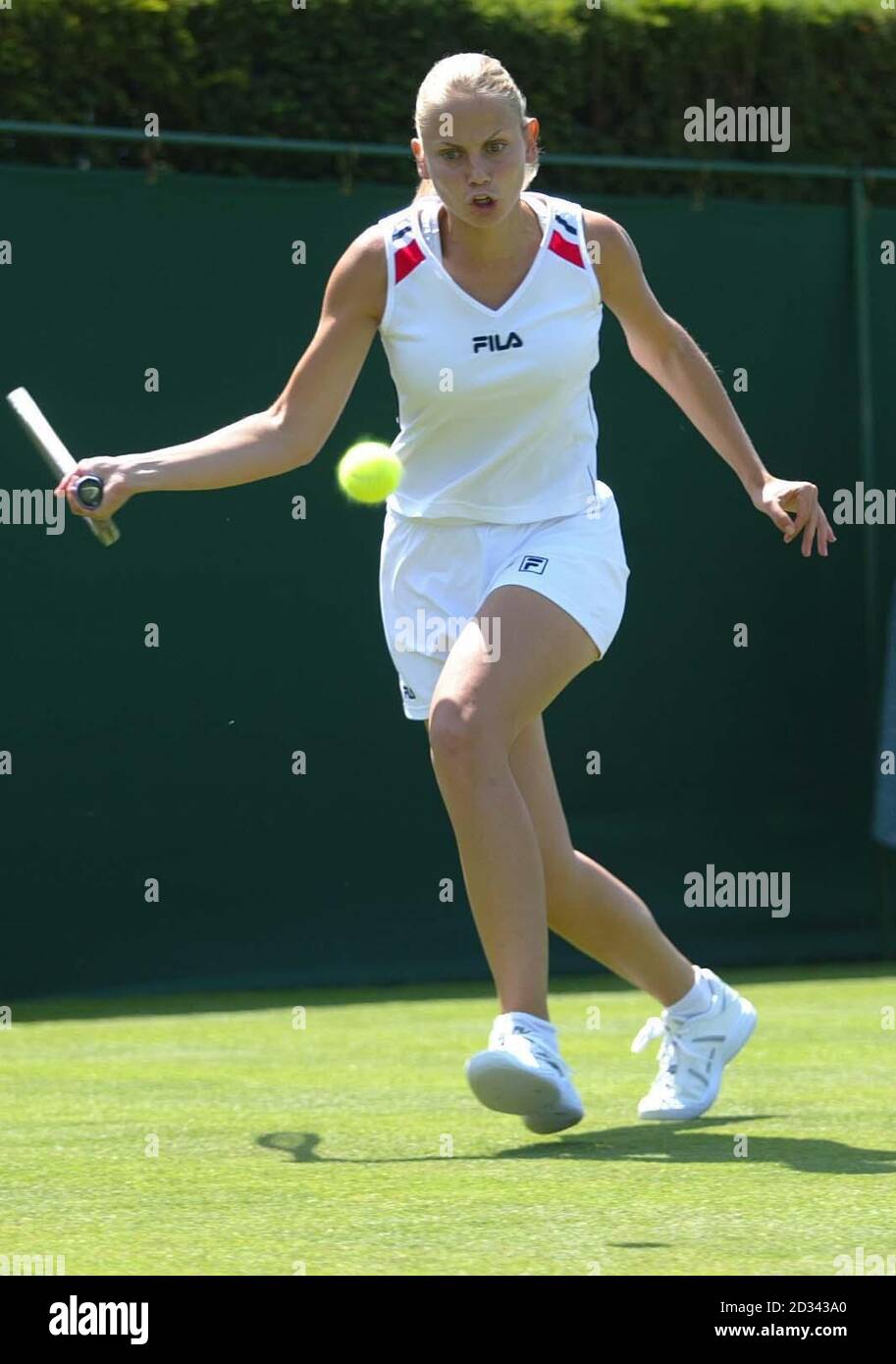 EDITORIAL USE ONLY, NO MOBILE PHONE USAGE. Jelena Dokic of Serbia Montenegro in action against Britain's Elena Baltacha at the All England Lawn Tennis Championships in Wimbledon. Stock Photo