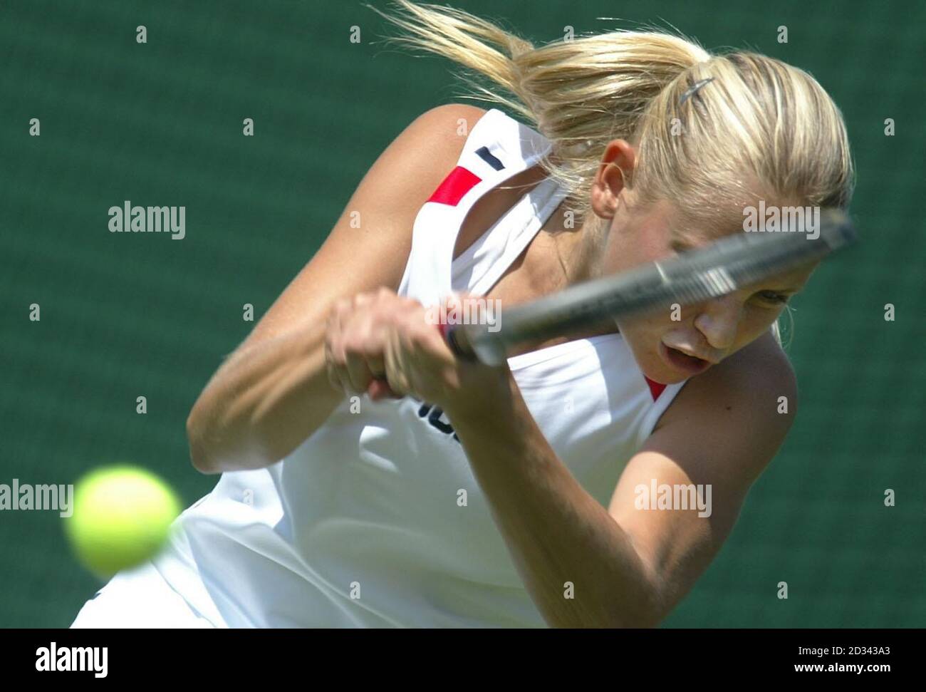 EDITORIAL USE ONLY, NOT FOR USE ON MOBILE PHONES: Jelena Dokic of Serbia Montenegro in action against Britain's Elena Baltacha at the All England Lawn Tennis Championships in Wimbledon. Stock Photo