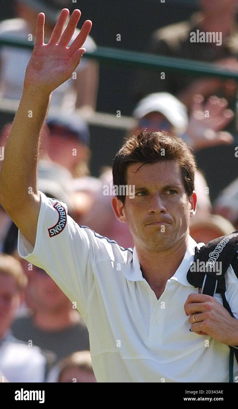 EDITORIAL USE ONLY, NO MOBILE PHONE USE. British tennis star Tim Henman celebrates beating Tomas Zib of the Czech Republic 6-2, 7-6, 3-6, 6-1 on Court One at the All England Lawn Tennis Championships in Wimbledon. EDITORIAL USE ONLY, NO MOBILE PHONE USE. Stock Photo