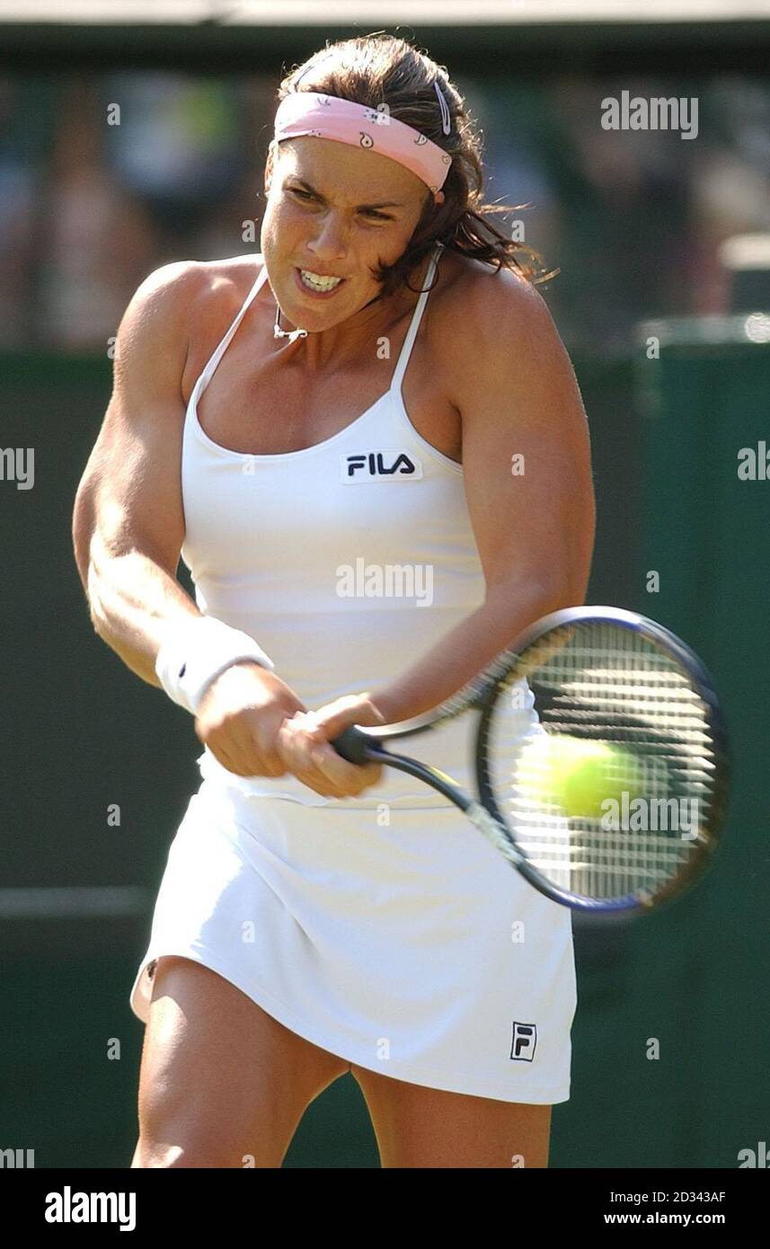 EDITORIAL USE ONLY, NOT FOR USE ON MOBILE PHONES Jennifer Capriati from the  USA in action against Myriam Cassanova of Switzerland at the All England  Lawn Tennis Championships in Wimbledon. Capriati won