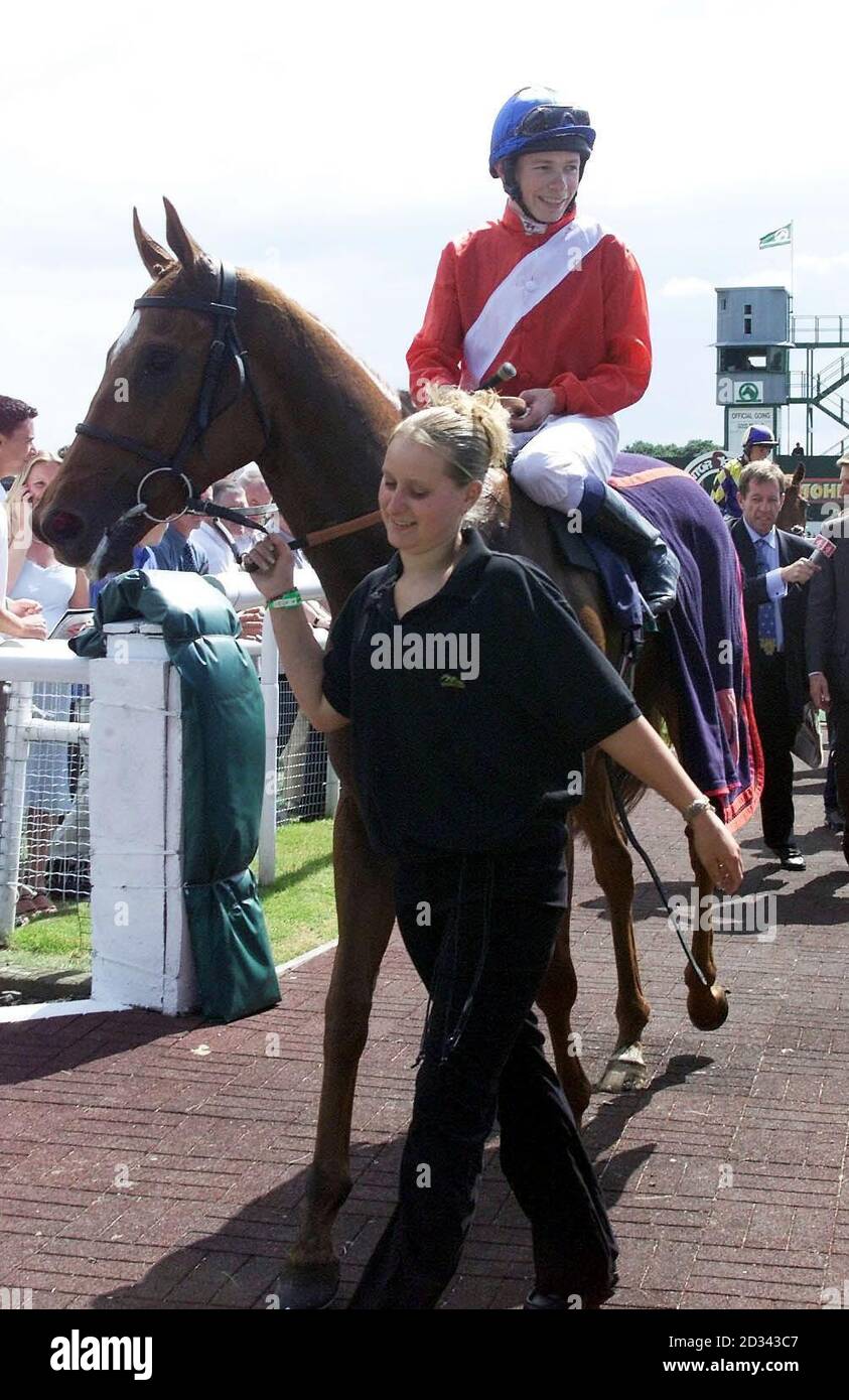 Unleash with jockey Jamie Spencer walks to the winners enclosure after ...