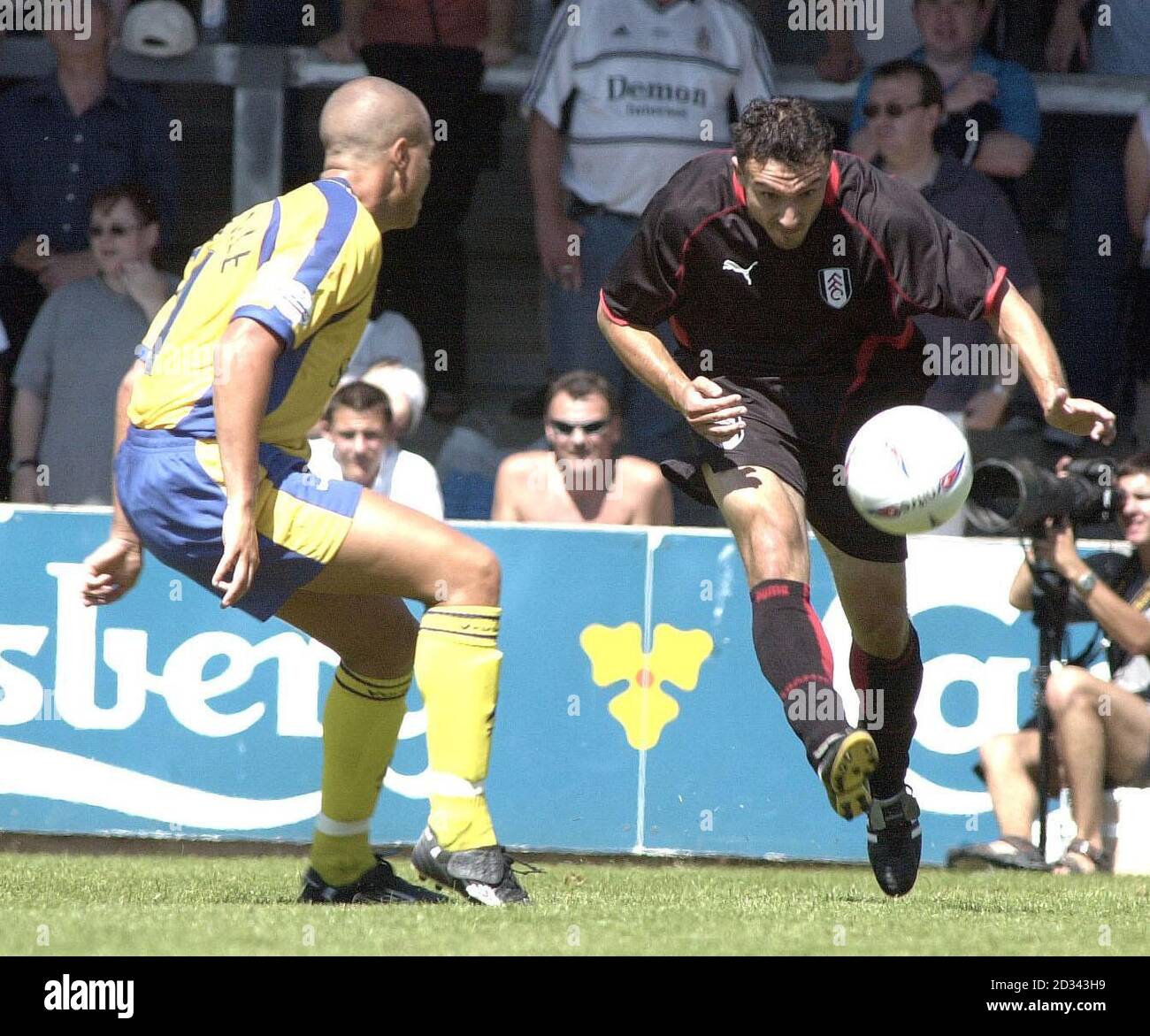 Fulham's Steed Malbranque (R) and Torquay's Lee Conoville  during their pre-season friendly at Torquay's Plainmoor ground. Stock Photo