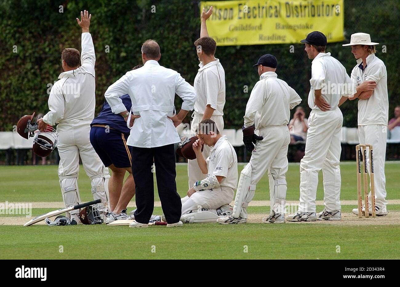 Sport cricket action injured injury kneeling hires stock photography