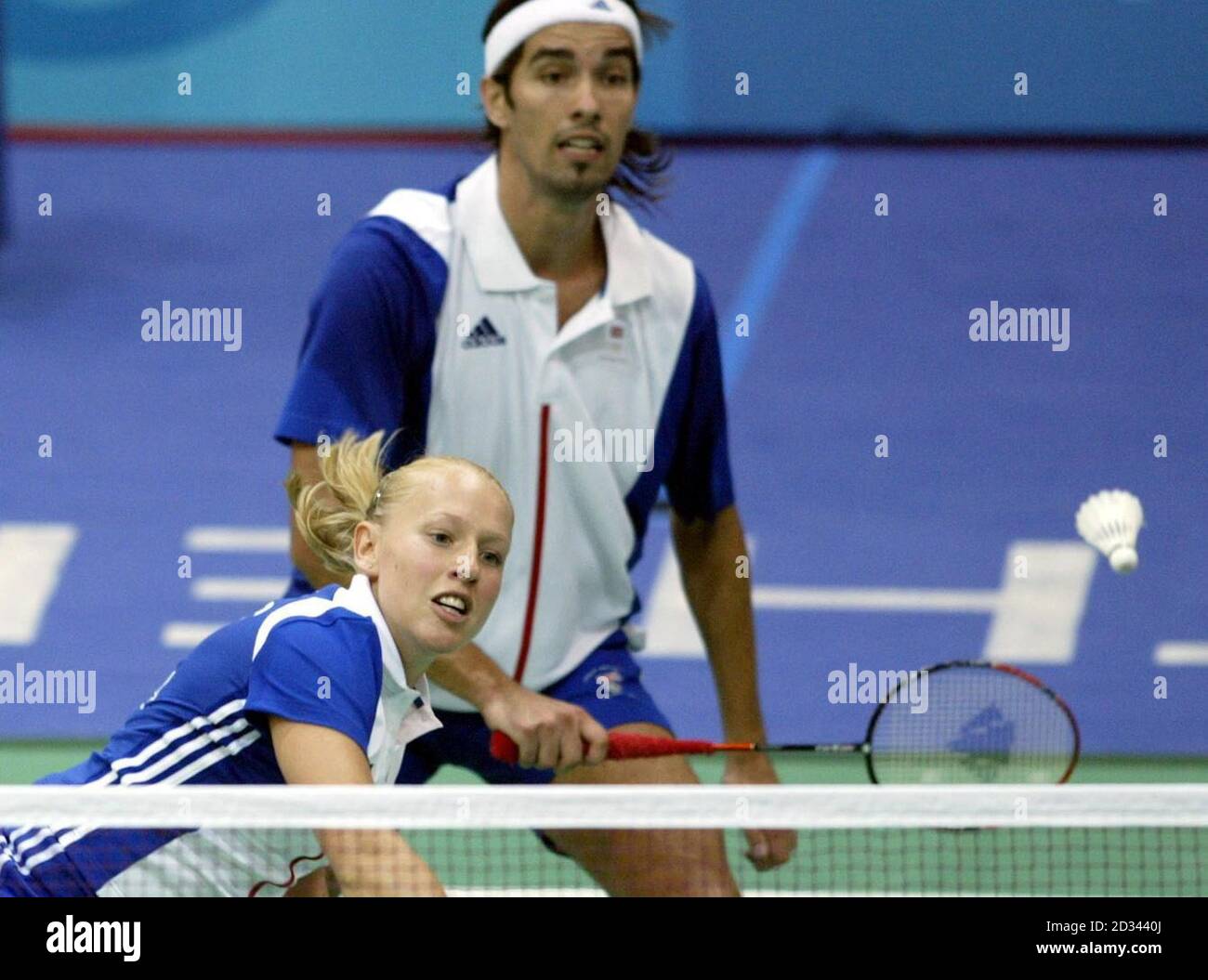 British badminton Silver Medal winners Nathan Robertson and Gail Emms during their Gold Medal Mixed Doubles match at the Goudi Olympic Hall in Athens, Greece. Emms and Robertson lost to China's Jun Zhang and Ling Gao 1-15  15-12  12-15.   Stock Photo