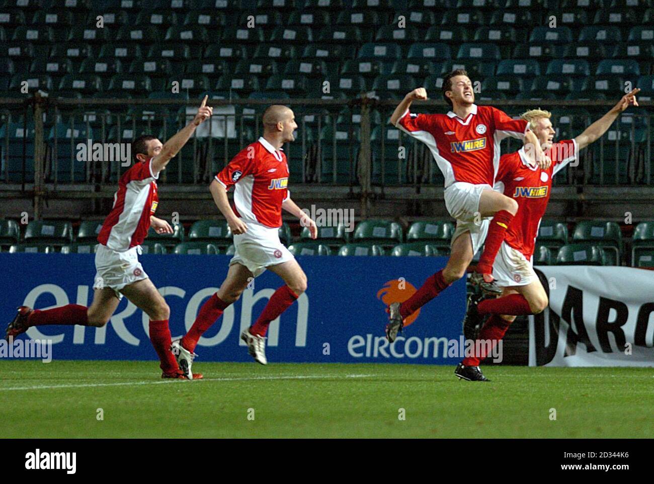(L-R) Shelbourne FC players, Jason Byrne, Dave Rogers, Alan Cawley and substitute Glen Fitzpatrick celebrate Fitzpatrick's late equaliser in the second-half of the Shelborne FC v Lille OSC UEFA Cup match at Landsdowne Road, Dublin. Full-time score:  2-2.      . Stock Photo