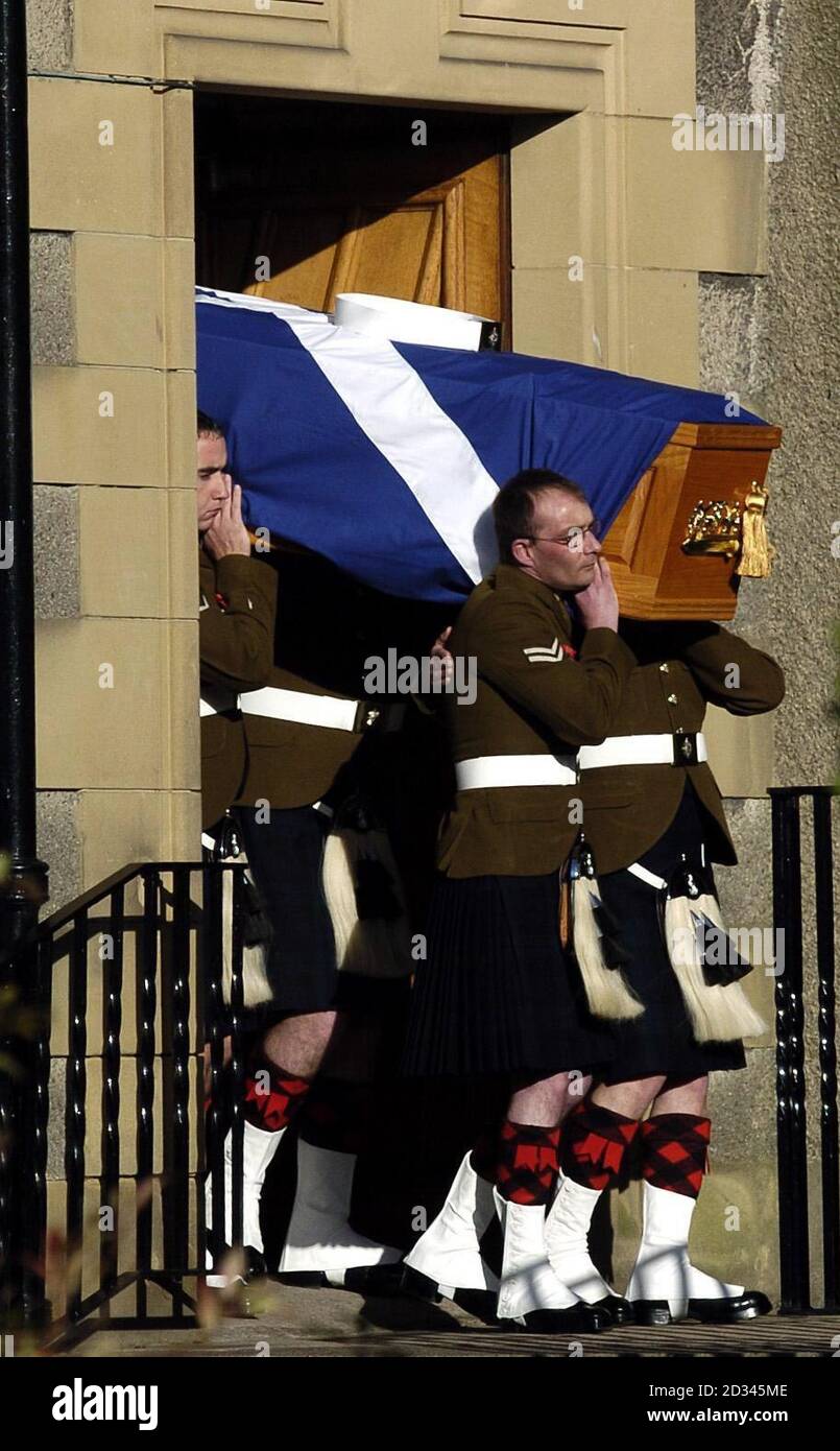 Fellow servicemen carry the coffin of Private Kevin McHale from St Patrick's Roman Catholic Church in Lochgelly. He was the first Black Watch soldier to be killed after the regiment's recent move to central Iraq and died when his Warrior armoured car overturned during the redeployment north on October 29. Stock Photo
