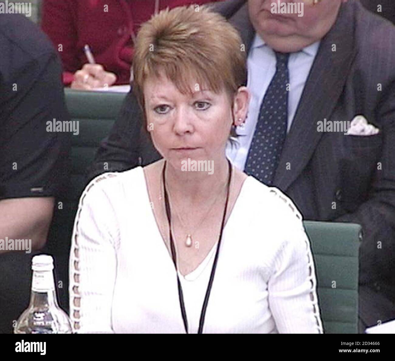 Janet Mattin, a parent of a soldier who died at the controversial Deepcut barracks gives evidence to the House of Common's defence committe in London as they step up their demands for a public inquiry. The Government yesterday announced a new review of allegations of abuse and bullying at the Army barracks. But is stopped short of the full public inquiry demanded by families and MPs. Four young solders at the Surrey base have died of gunshot wounds in unexplained circumstances. Stock Photo