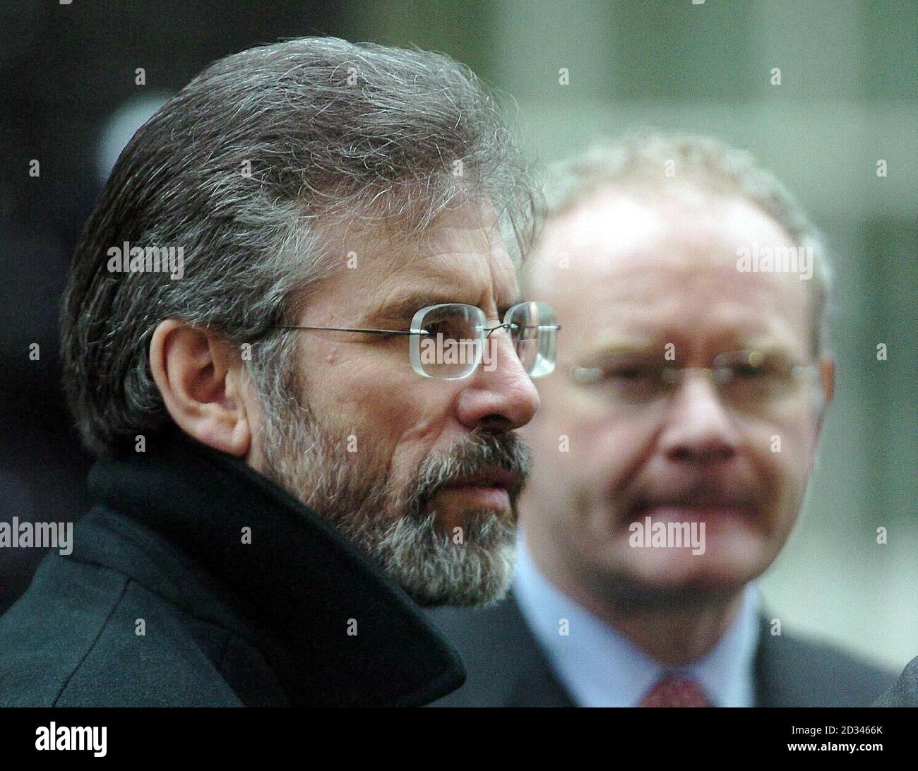 Sinn Fein leader Gerry Adams and Martin McGuinness arrive in Downing Street, London as the agonising effort to close a peace process deal continues. British and Irish government officials believe Sinn Fein and the Rev Ian Paisley's Democratic Unionists are tantalisingly close to striking a deal which would bring back power sharing and see the gun removed permanently from Northern Ireland politics. Stock Photo