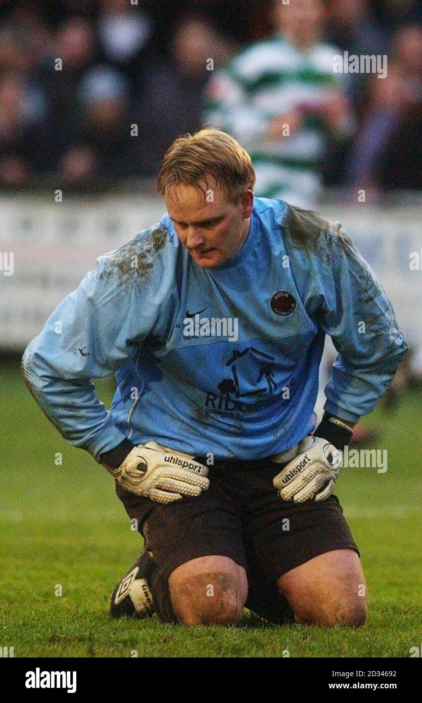 Histon goalkeeper Lance Key shows his dejection following Yeovil's third  goal during the FA Cup second round match at the Glass World Stadium,  Histon, Cambridge, Saturday December 4, 2004. THIS PICTURE CAN