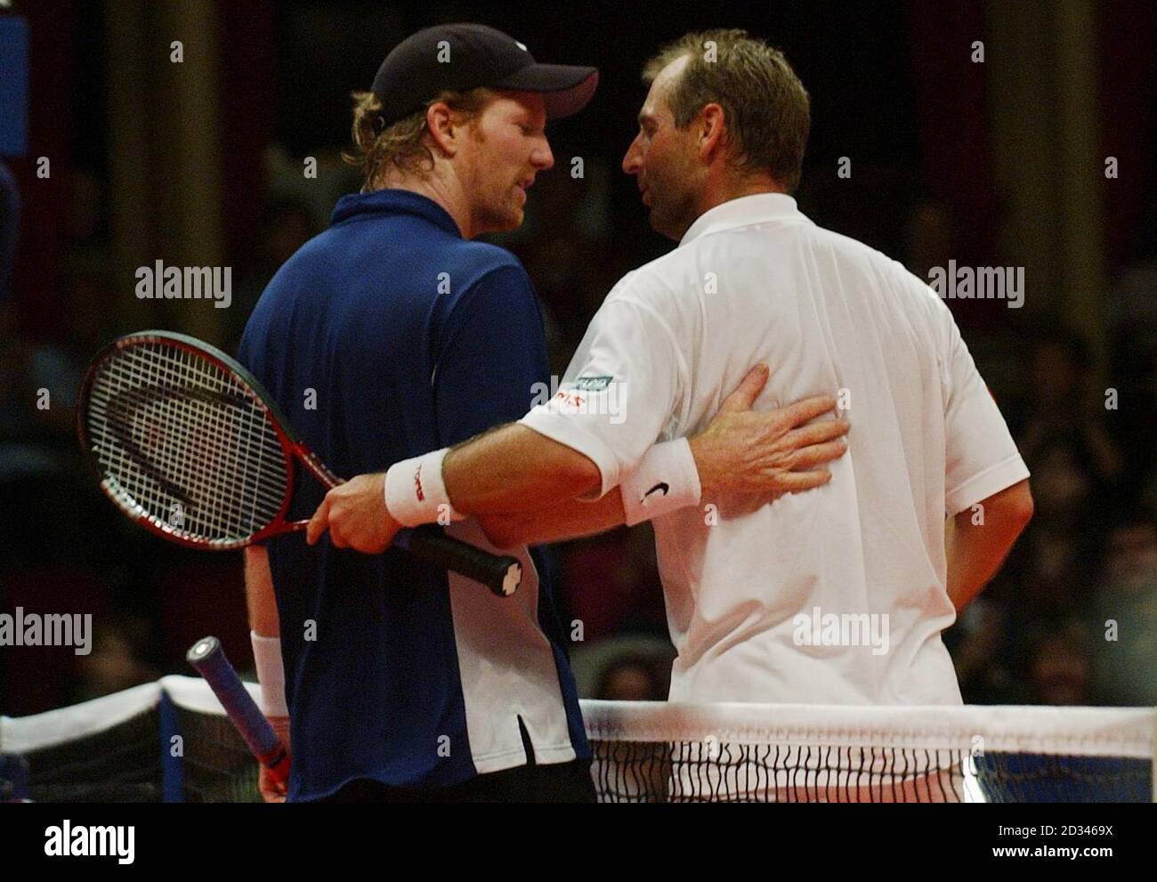 Jim Courier (left) and Thomas Muster leave the court after Courier won  during the Masters Tennis final by two sets to one at the Royal Albert  Hall, London Stock Photo - Alamy