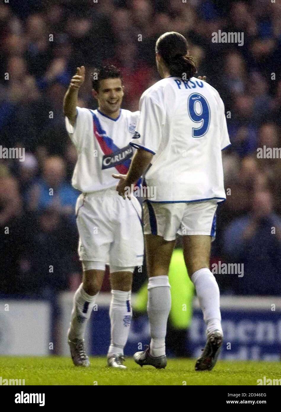 Rangers striker Nacho Novo (left) celebrates his penalty goal with strike partner Dado Prso (right) during the Bank of Scotland Premier League match at Ibrox Stadium, Glasgow, Saturday December 11, 2004. Stock Photo