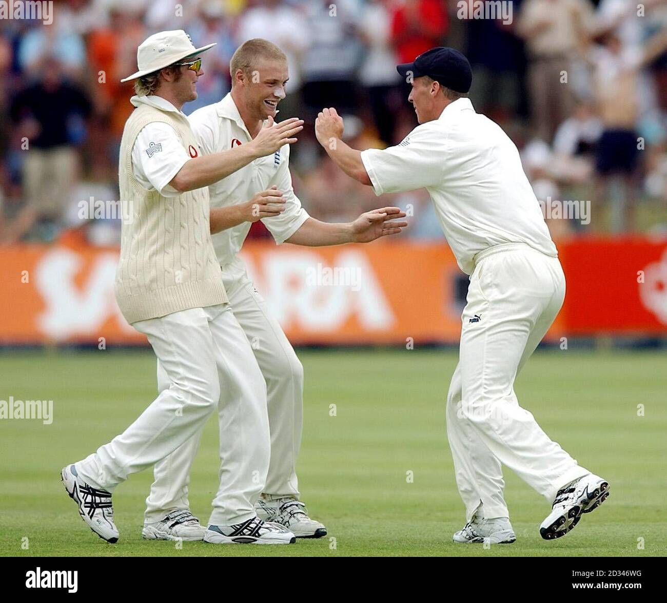 England's Andrew Flintoff (centre) runs over to celebrate his wicket of South Africa captain Graeme Smith caught out by Simon Jones (right). EDITORIAL USE ONLY  Stock Photo