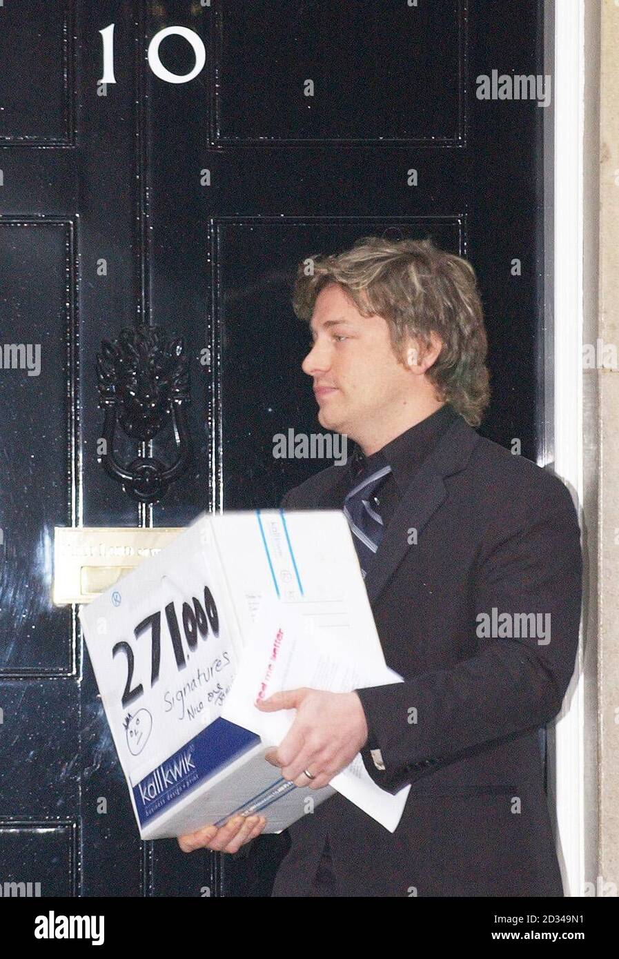 Celebrity TV chef Jamie Oliver delivers a petition demanding better food for pupils. Stock Photo