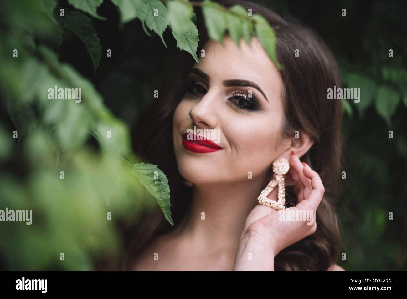 Beautiful young teen girl ready for prom. Head shot, bijoux earrings Stock  Photo - Alamy