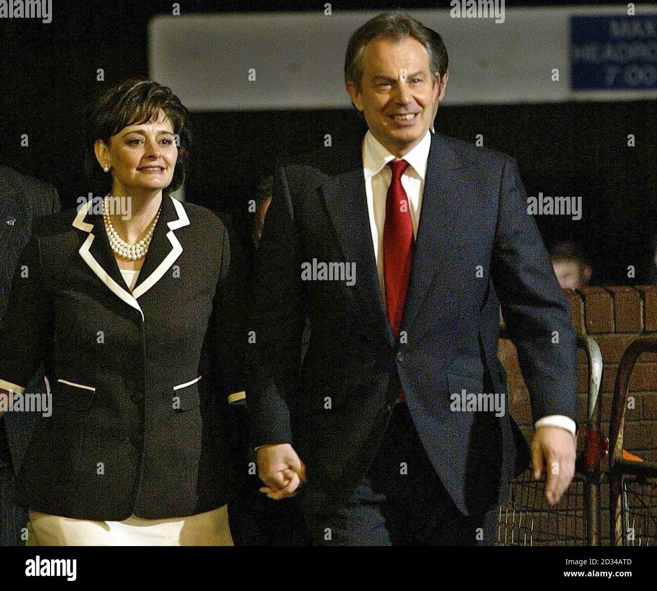 British Prime Minister Tony Blair with his wife Cherie arrive at the