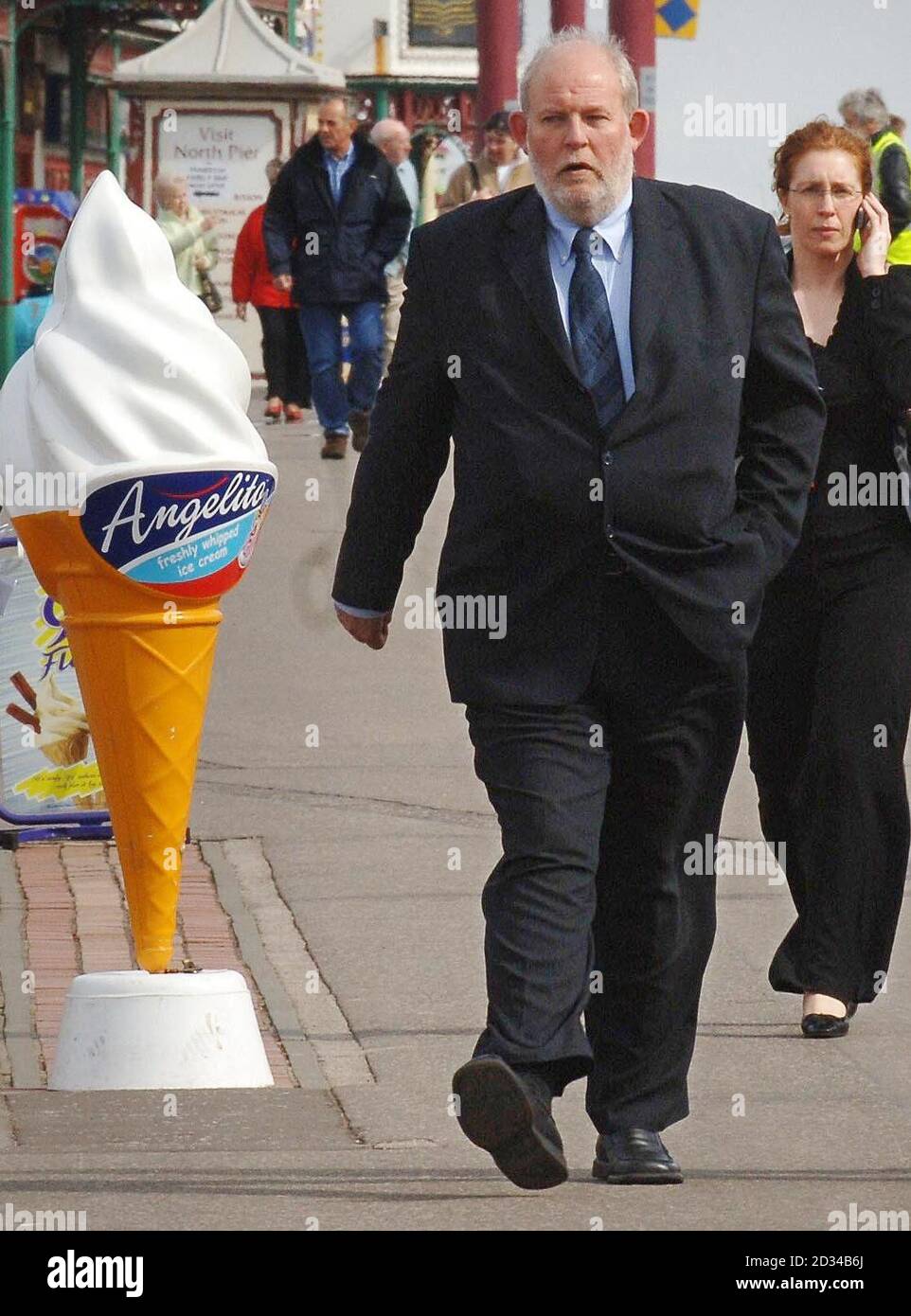 Home Secretary Charles Clarke walks along the Blackpool Promenade, before outlining his vision of neighbourhood policing to rank-and-file police officers. Stock Photo