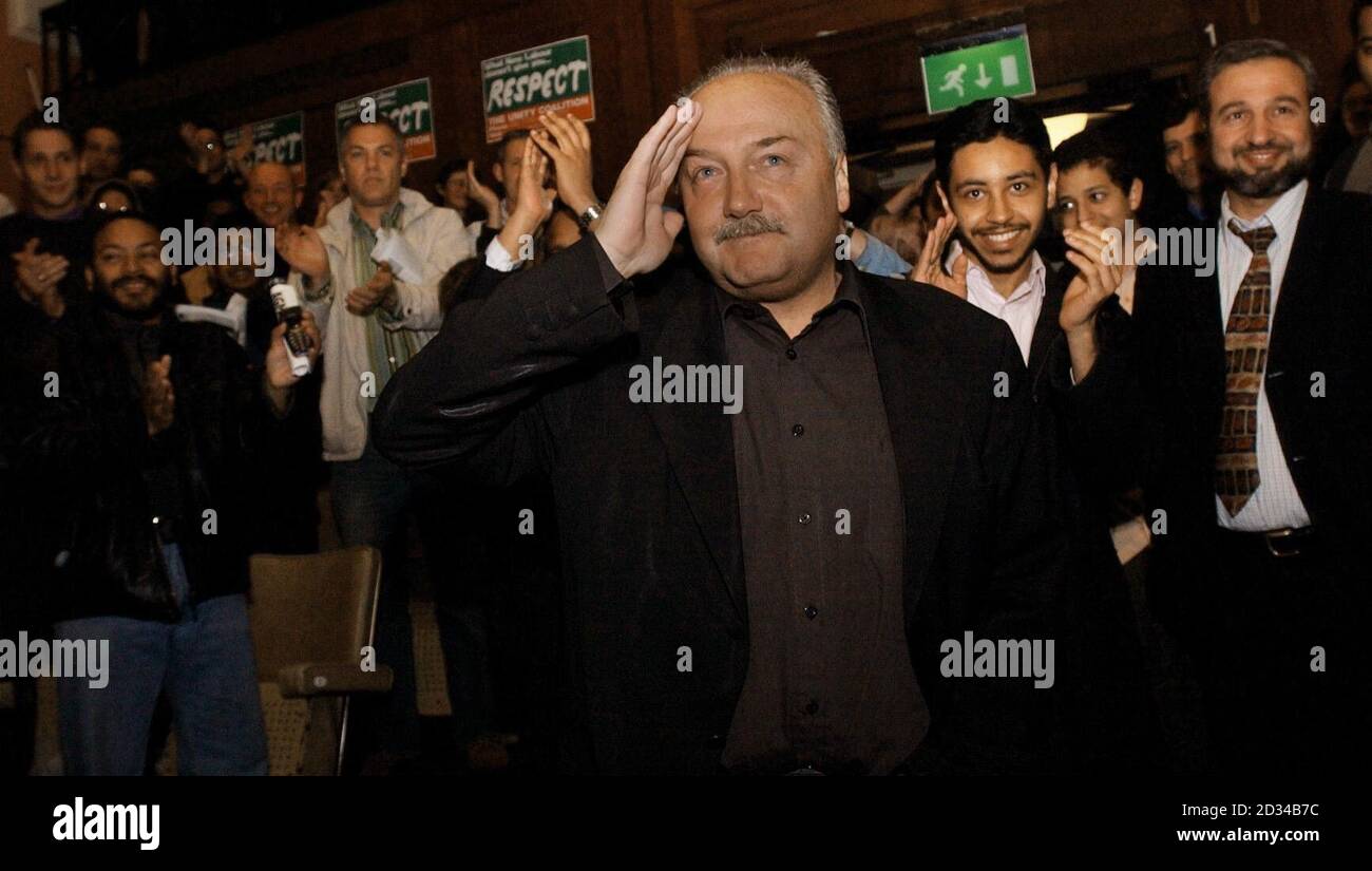 Respect MP George Galloway receives a standing ovation on his arrival at a party a day after his ferocious showdown with US senators. Stock Photo