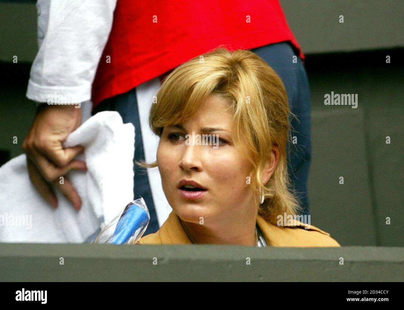 Mirka Vavrinec, girlfriend of Switzerland's Roger Federer watches him in action against Germany's Nicolas Kiefer. Stock Photo