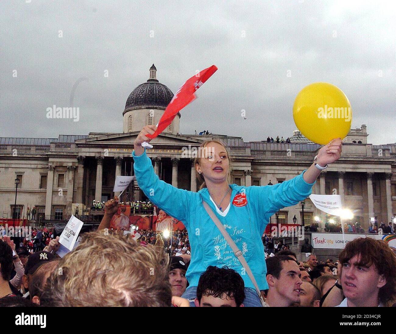 Crowds in Trafalgar Square celebrate after London won the right to host the 2012 Olympic Games. Stock Photo