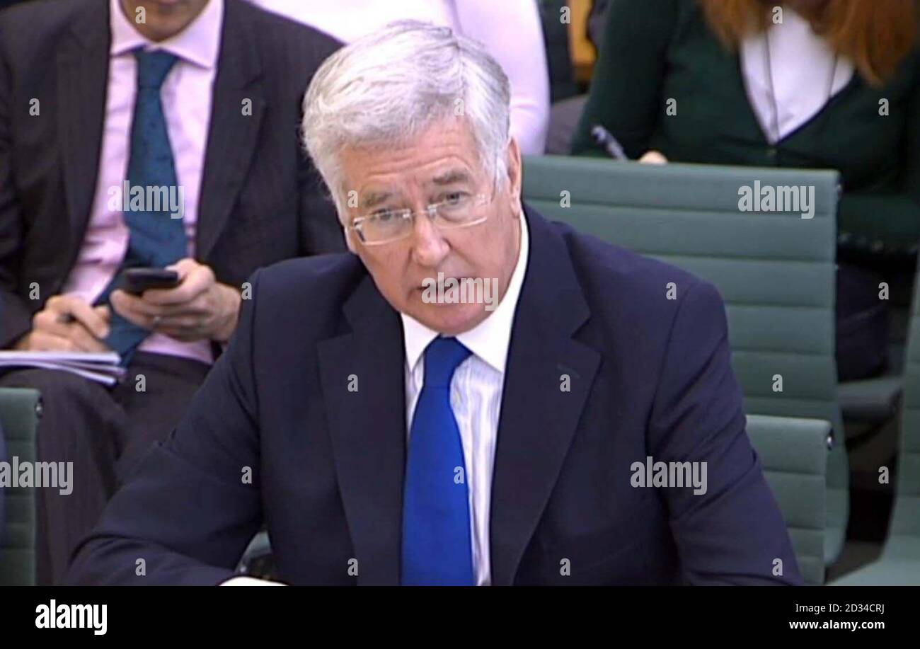 Defence Secretary Michael Fallon gives evidence in front of the Defence Select Committee on the subject of Defence Expenditure. Stock Photo