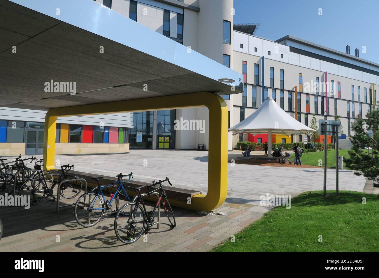 Bicycle shed in front of the modern Royal Hospital for Children buildng in Glasgow, Scotland Stock Photo