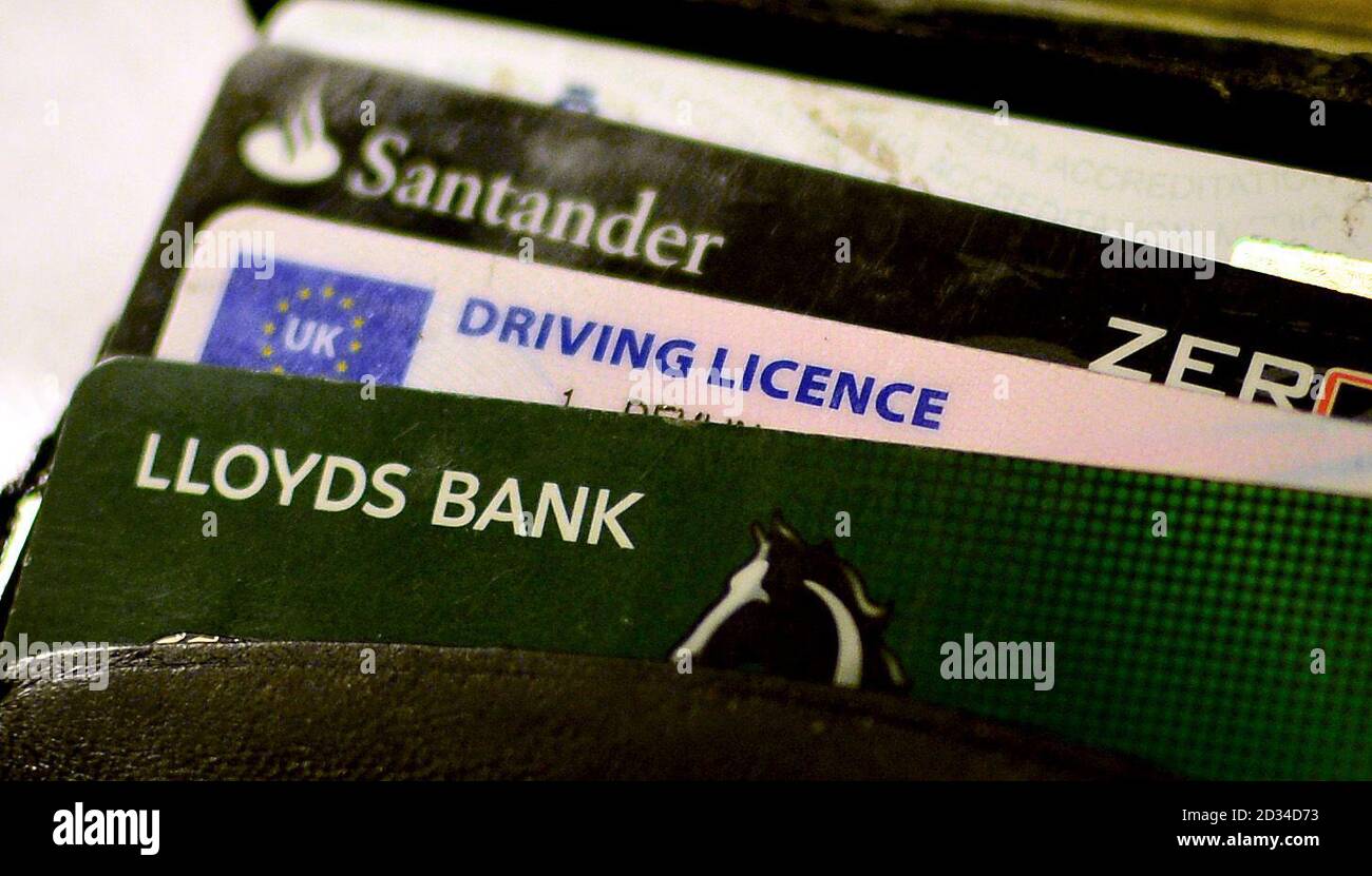 A UK driving licence placed in a wallet, London Stock Photo Alamy