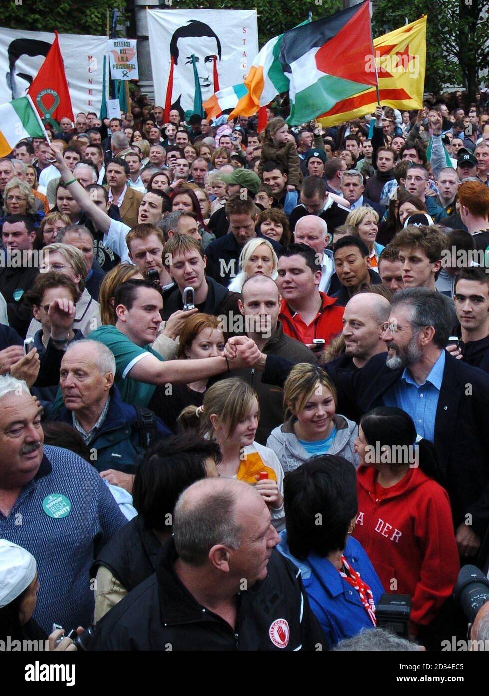 Sinn Fein President Gerry Adams (bottom right) among the thousands of supporters at a rally to mark the party's 100th anniversary Dublin, Saturday September 24, 2005. He said the IRA was going to honour its commitment to dump its arms in the 'near future'. See PA story ULSTER Politics. PRESS ASSOCIATION Photo. Photo credit should read: John Giles/PA Stock Photo