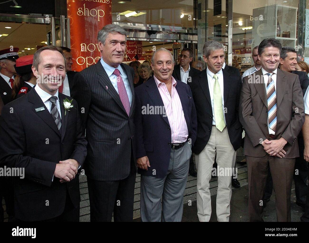 Oxford Street retailers (L-R) Noel Saunders,Managing Director of John Lewis. Paul Kelly,Chief Executive Selfridges. Philip Green, Director of Arcadia and BHS.Stuart Rose,Chief Executive Marks and Spencer, and Gary Reeves, Chief Executive of New West End Company line up in Oxford Street after the opening of the celebratory street party.The event has been created to attract shoppers back to Oxford Street Saturday 1 October 2005. See PA story CONSUMER Oxford Street. PRESS ASSOCIATION Photo. Photo credit should read: Michael Stephens/PA Stock Photo