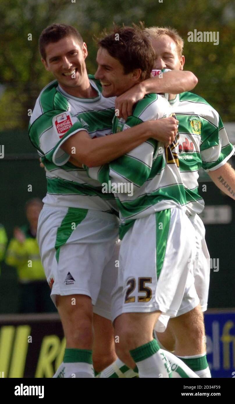 Yeovil's Phillip Jevons (L) celebrates his first goal with Arron Davies during the Coca Cola League One match at Huish Park, Yeovil, Saturday October 22, 2005. Yeovil won 3-0 over Nottingham Forest. PRESS ASSOCIATION Photo. Photo credit should read: Neil Munns/PA. THIS PICTURE CAN ONLY BE USED WITHIN THE CONTEXT OF AN EDITORIAL FEATURE. NO UNOFFICIAL CLUB WEBSITE USE. Stock Photo