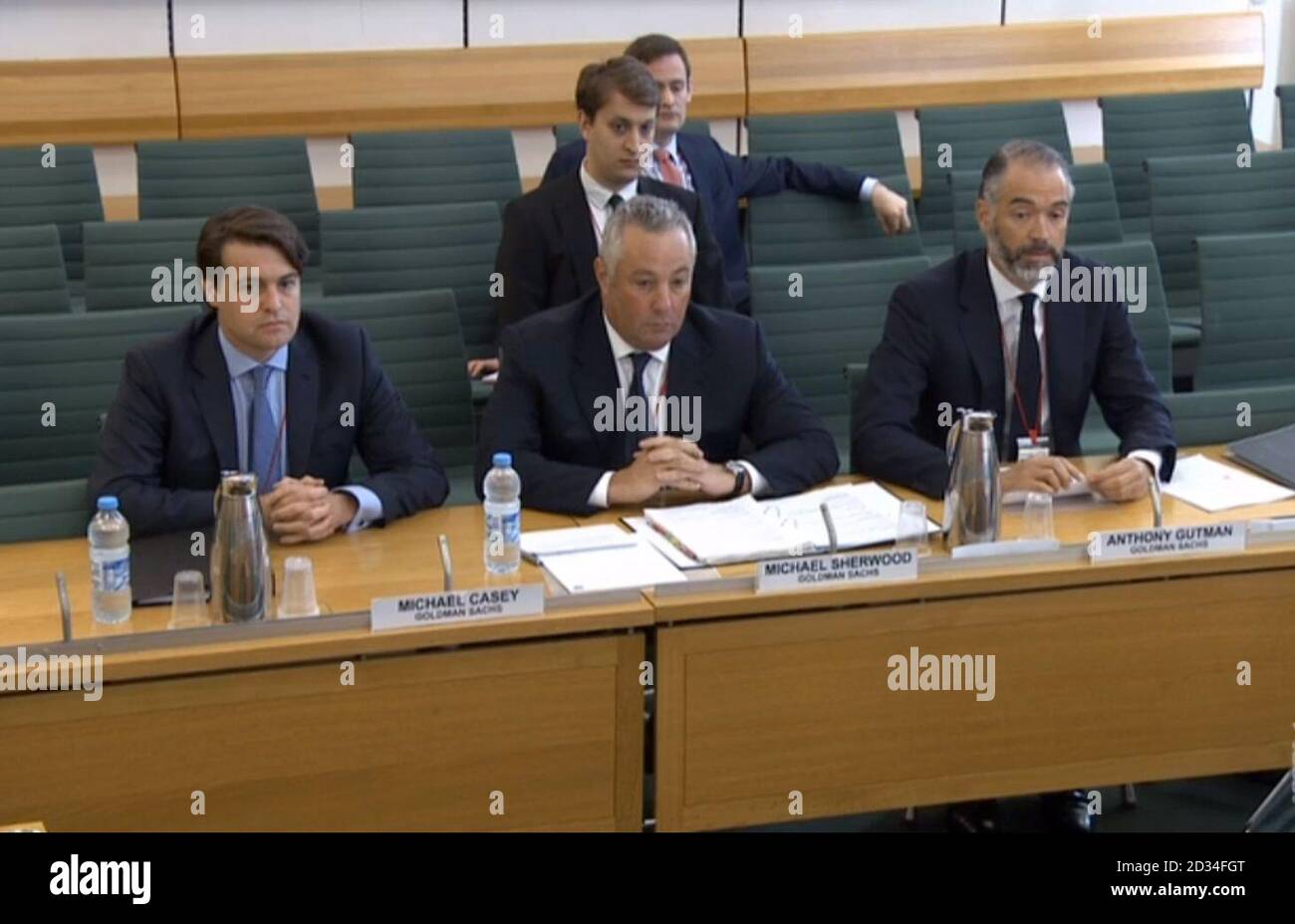 (left to right) Michael Casey of Goldman Sachs, Michael Sherwood, Vice Chairman at Goldman Sachs, and Anthony Gutman, Co-Head of Goldman Sachs and EMEA Investment Banking Services appear before the Business, Innovation and Skills Committee at Portcullis House in London, on the collapse of BHS. Stock Photo