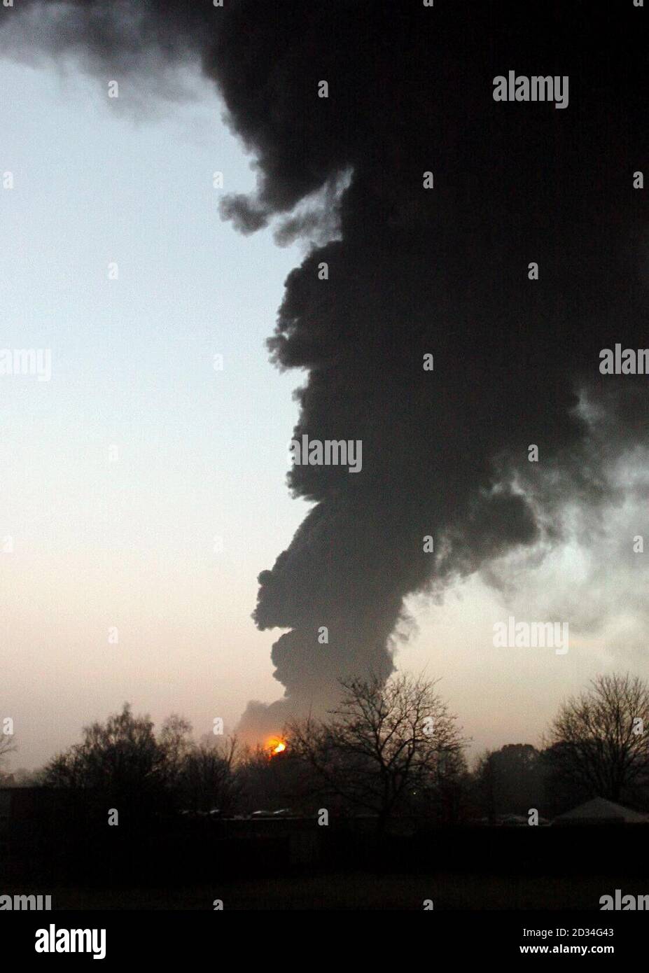 A black plume of smoke billows from the Buncefield fuel terminal in Leverstock Green, Herts, close to Hemel Hempstead and junction 8 of the M1 Sunday December 11 2005, where Three major explosions rocked an oil depot early today. See PA story BLAST Explosion. PRESS ASSOCIATION Photo. Photo credit should read:Michael Stephens/PA Stock Photo