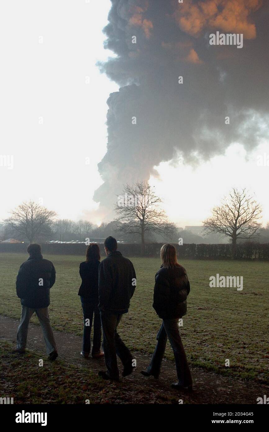 A black plume of smoke billows from the Buncefield fuel terminal in Leverstock Green, Herts, close to Hemel Hempstead and junction 8 of the M1 Sunday December 11 2005, where Three major explosions rocked an oil depot early today. See PA story BLAST Explosion. PRESS ASSOCIATION Photo. Photo credit should read:Michael Stephens/PA Stock Photo