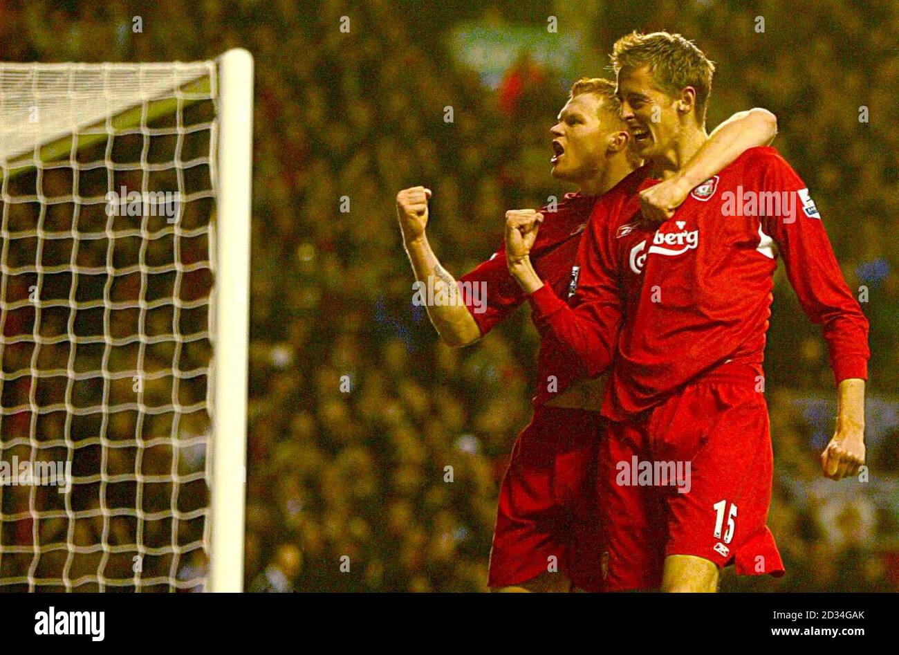Liverpool's Peter Crouch celebrates his goal with John Arne  Riise Stock Photo