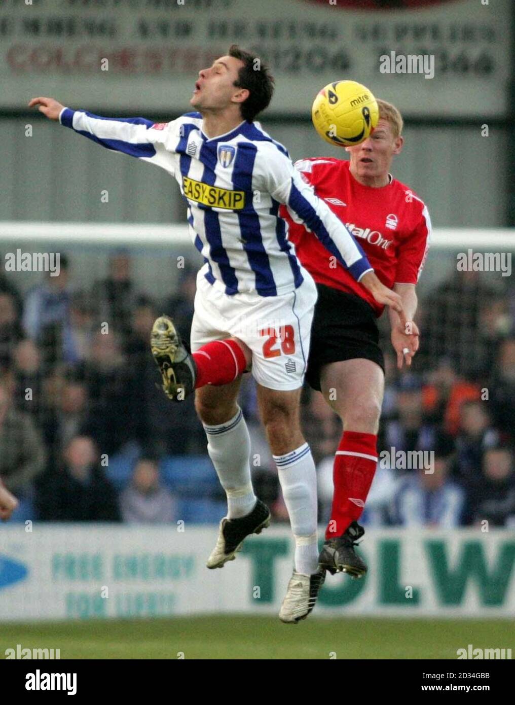 Colchester's Richard Garcia (L) jumps for the ball with Nottingham Forest's Gary Holt during the Coca-Cola Division One match at Layer Road, Colchester, Monday January 2, 2006. PRESS ASSOCIATION Photo. Photo credit should read: Mark Lees/PA. THIS PICTURE CAN ONLY BE USED WITHIN THE CONTEXT OF AN EDITORIAL FEATURE. NO UNOFFICIAL CLUB WEBSITE USE. Stock Photo