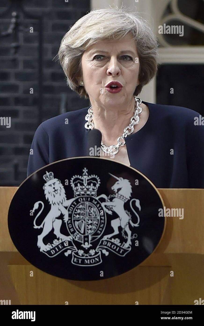 New Prime Minister Theresa May makes a speech outside 10 Downing Street, London, after meeting Queen Elizabeth II and accepting her invitation to become Prime Minister and form a new government. Stock Photo