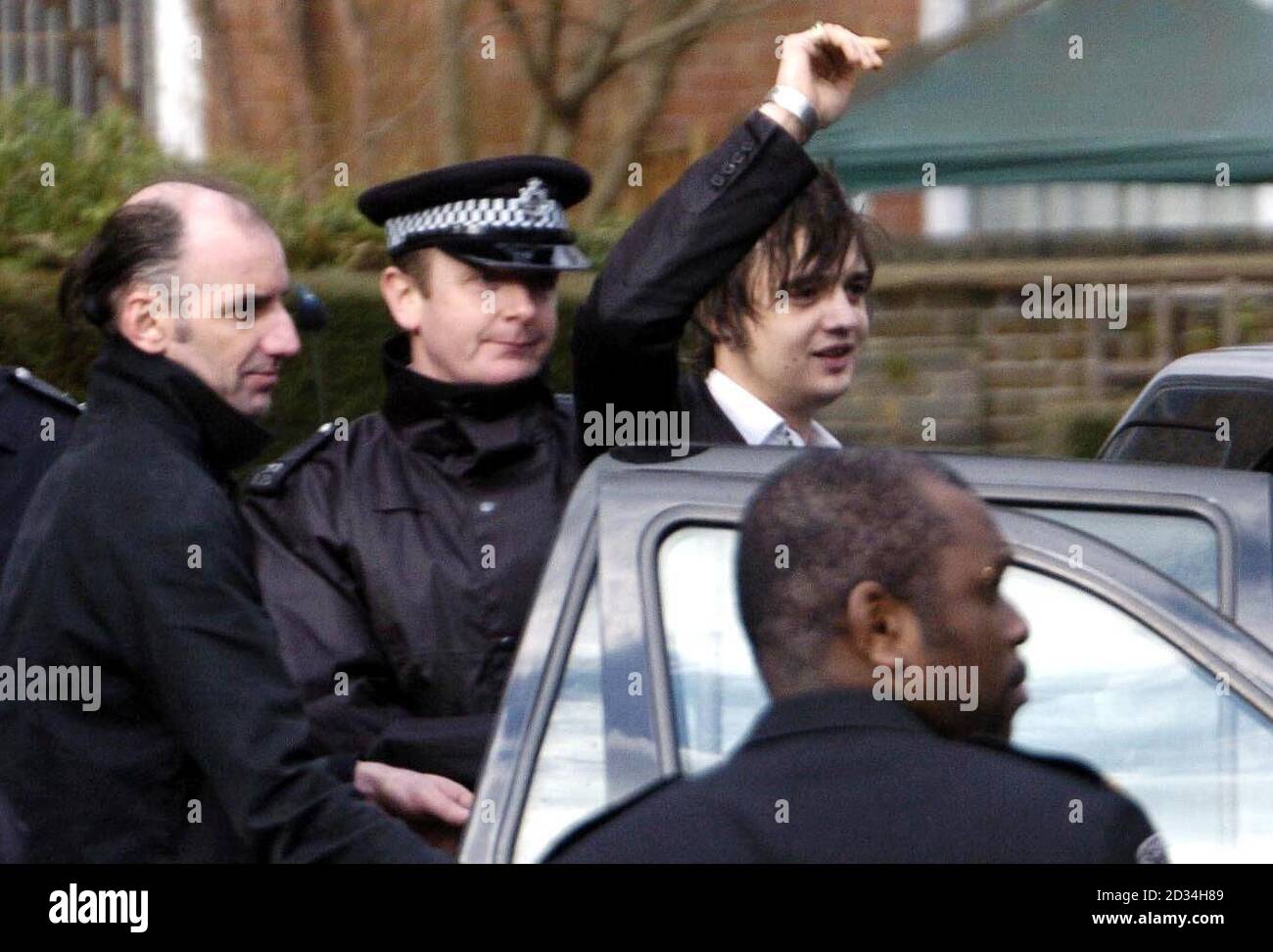 Pete Doherty leaves Ealing Magistrates Court in west London, Wednesday February 8, 2006, with a 12-month community order after admitting a series of drug offences. The 26-year-old Babyshambles front man and former boyfriend of Kate Moss was sentenced after earlier pleading guilty to seven charges of possessing illegal substances. The singer was also ordered to take part in a drug rehabilitation programme for 12 months and warned that if he breached this order, he could face a custodial sentence. See PA story COURTS Doherty. PRESS ASSOCIATION Photo. Photo credit should read: Ian Nicholson / PA. Stock Photo