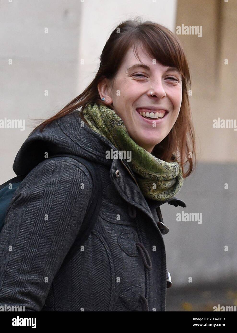 Greenpeace activist Alison Garrigan leaves Westminster Magistrates Court, London after she and Luke Jones were each given a six-month conditional discharge and ordered to pay costs of &pound;85, and a victim surcharge of &pound;30 when they climbed Nelson's Column in London's Trafalgar Square last April to highlight air pollution in Britain. Stock Photo