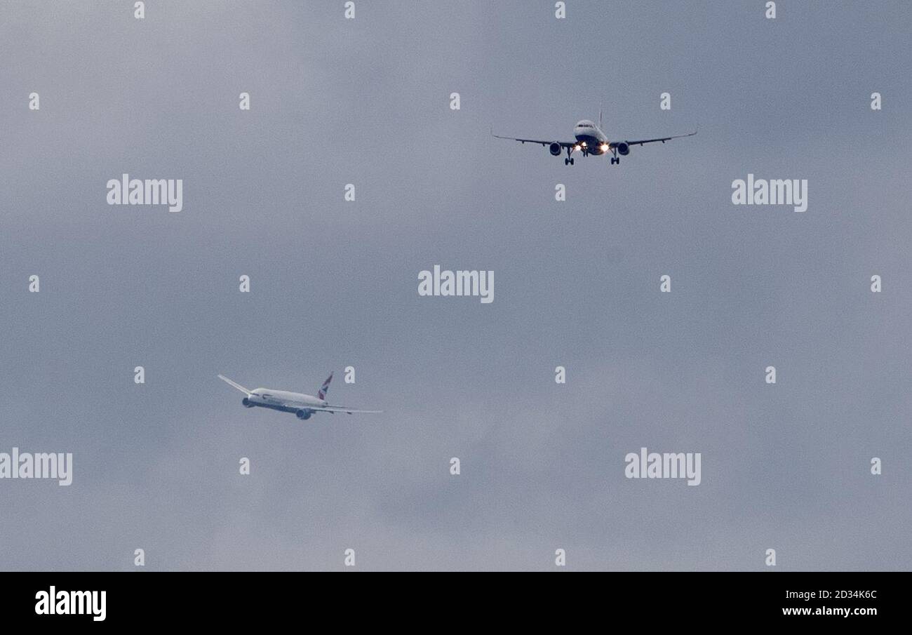Planes land at Heathrow Airport in west London, as air traffic controllers are dealing with the busiest day in the UK's aviation history on Friday. Stock Photo