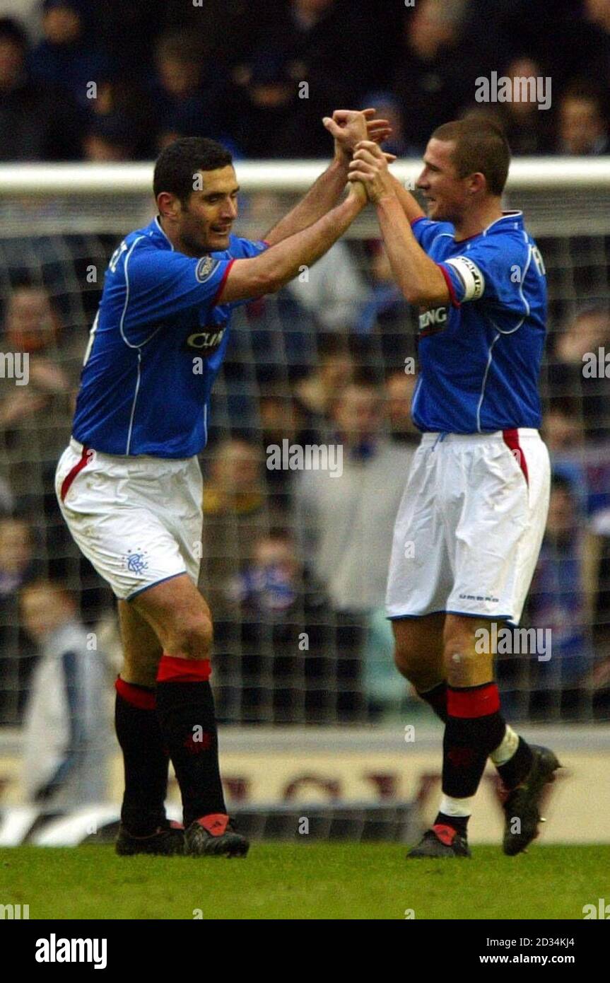 Rangers' Julien Rodriguez (L) celebrates his goal with Barry Ferguson during the Bank of Scotland Premier League match against Kilmarnock at Ibrox Stadium, Glasgow, Saturday March 11, 2006. PRESS ASSOCIATION Photo. Photo credit should read: David Cheskin/PA. **EDITORIAL USE ONLY** Stock Photo