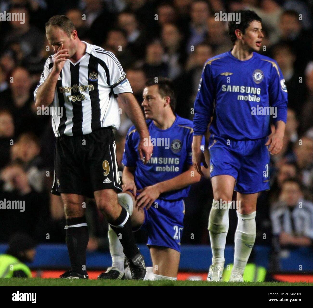 Newcastle United captain Alan Shearer (L) shows his dejection after Chelsea captain John Terry (C) stops another attack during during the FA Cup sixth round match at Stamford Bridge, London, Wednesday March 22, 2006. PRESS ASSOCIATION Photo. Photo credit should read: Nick Potts/PA. Stock Photo