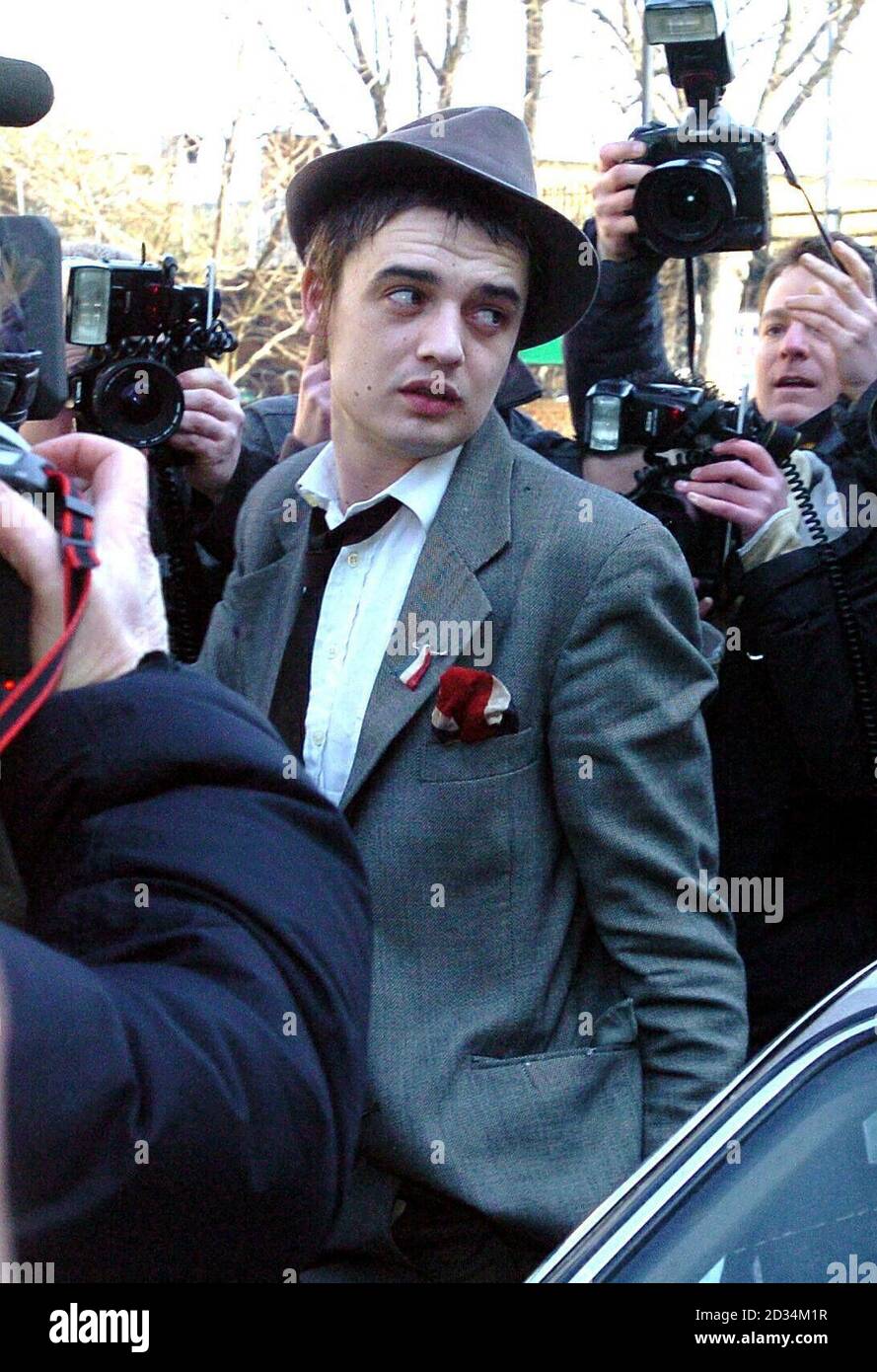 Babyshambles singer Pete Doherty arrives at Thames Magistrates Court in east London, Thursday March 23, 2006, to face drugs charges. Doherty is charged with seven counts of possessing controlled drugs. He is accused of having 0.406gm of heroin, 0.776gm of crack cocaine, 0.332gm of cannabis resin and 5.94gm of cannabis on December 18 last year in Riverside Close in east London. On January 14 this year police allege he had 3.103gm of heroin, 3.664gm of crack cocaine and 2.503gm of cannabis in Dunlace Road, also in east London. See PA story COURTS Doherty. PRESS ASSOCIATION Photo. Photo credit sh Stock Photo