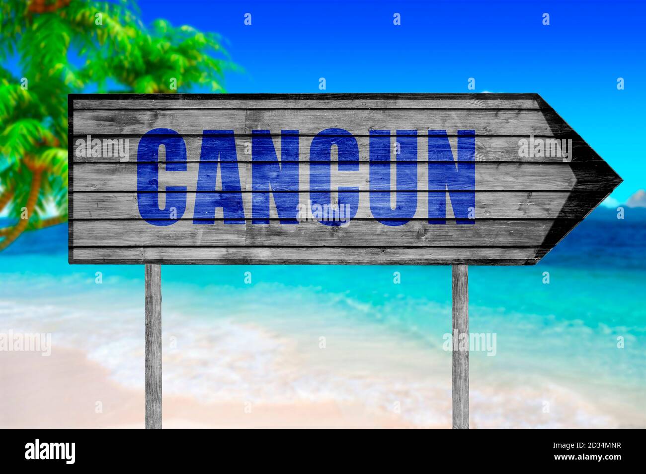 cancun sign on beach