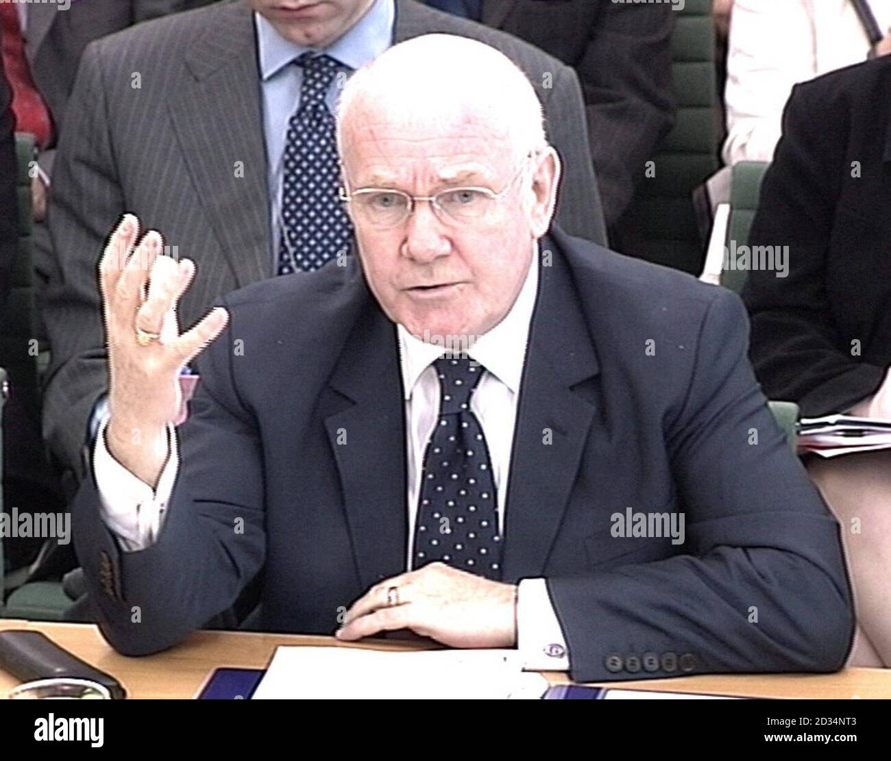 Home Secretary John Reid answering questions from the House of Commons Home Affairs Committee at