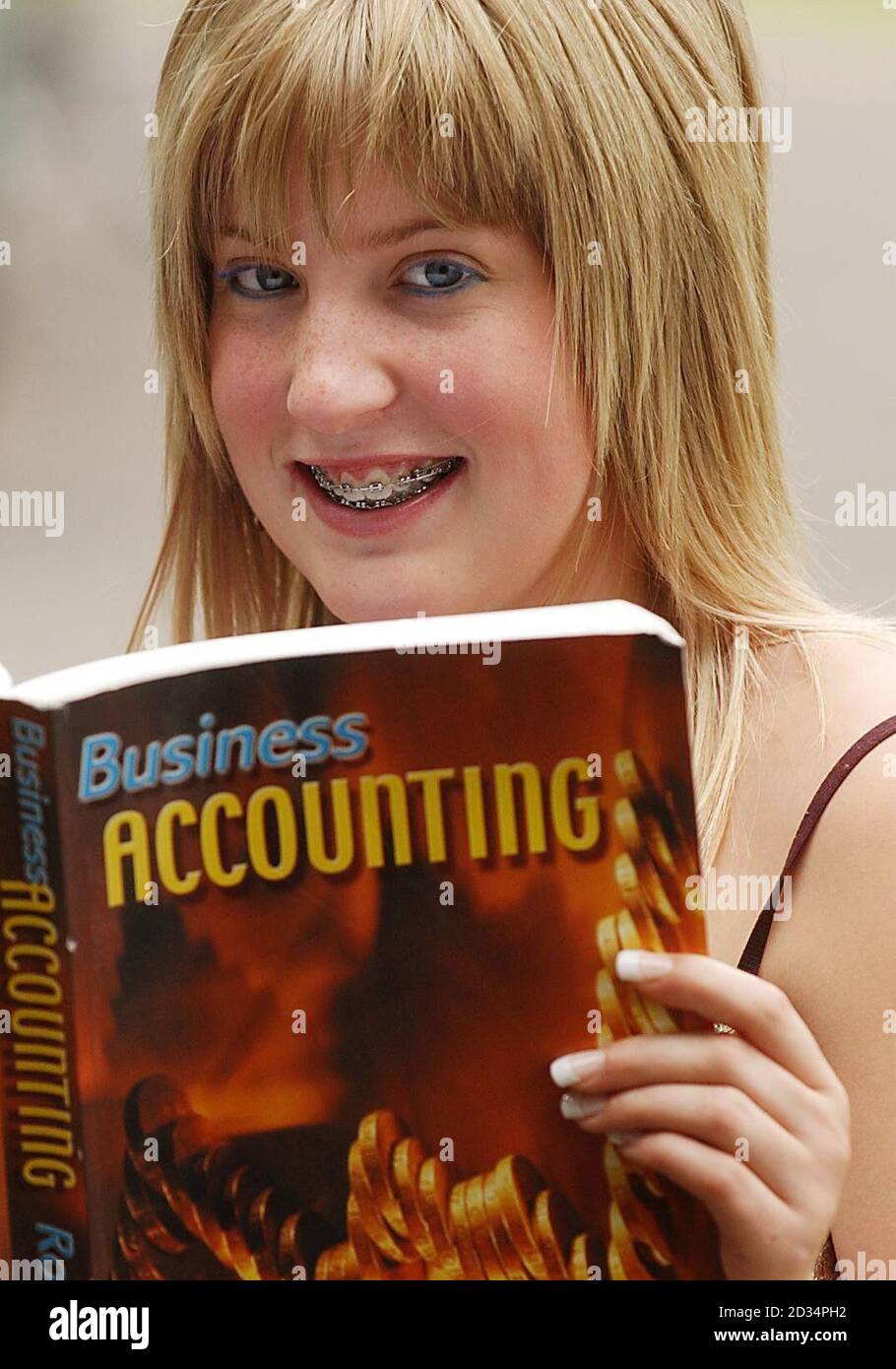 Aspiring accountant Emma McDowall, 17, who has been named as the first recipient of a scholarship set up in memory of one of the victims of the July 7 bombings in London, reads a textbook at Lockerbie Academy. Stock Photo